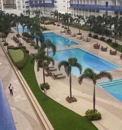 Cnholy Condo At Sea Residences Manila Exteriör bild