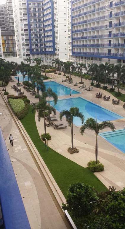 Cnholy Condo At Sea Residences Manila Exteriör bild
